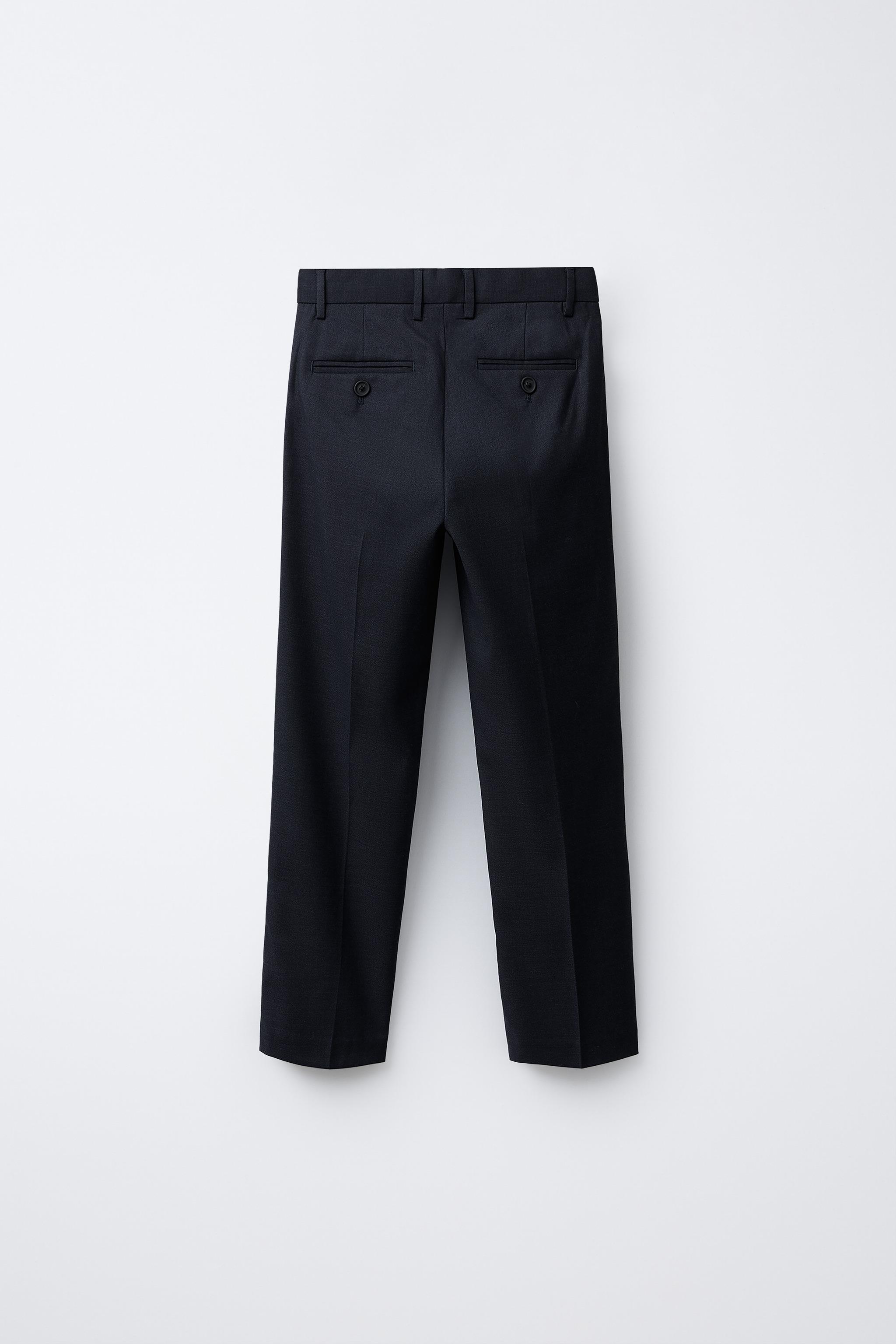 TEXTURED SUIT PANTS